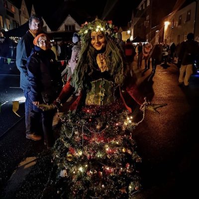 Woman dressed up as Christmas Tree at Dunster By Candlelight - @fayemarieperformer