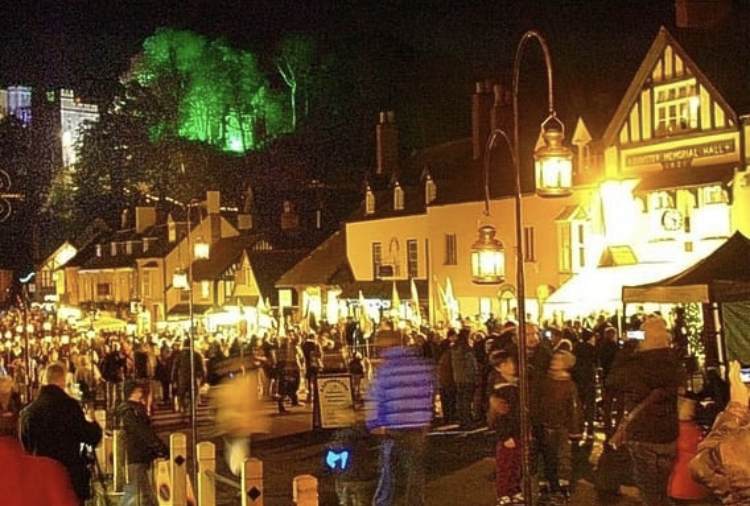 Dunster By Candlelight - a photo of the medieval village lit up by lanterns and out for the fair