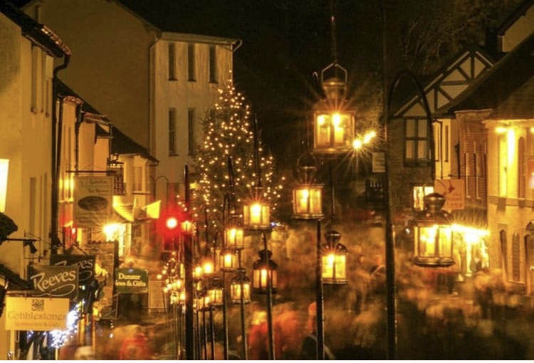 Dunster By Candlelight - a photo of the medieval village lit up by lanterns