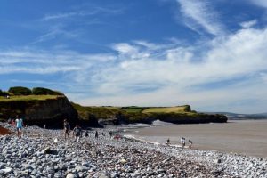 Walkers on Kilve Beach