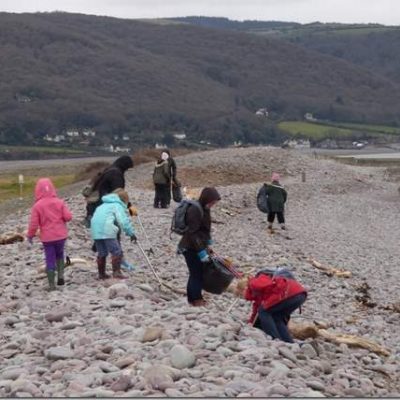 Legends cleaning up the beach.