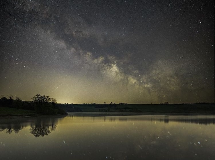 Exmoor Dark Skies across a lake with spooky Halloween vibes, or perfect for stargazing