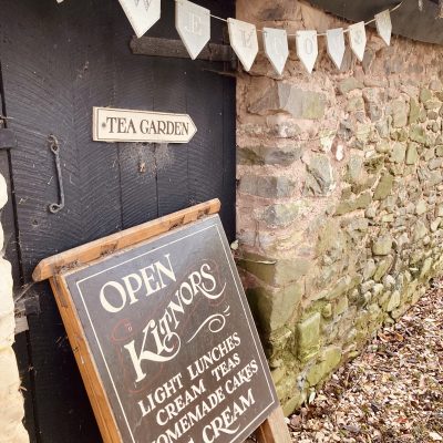 Entrance to Kitnors Tea Rooms and Gardens with cute signage and bunting