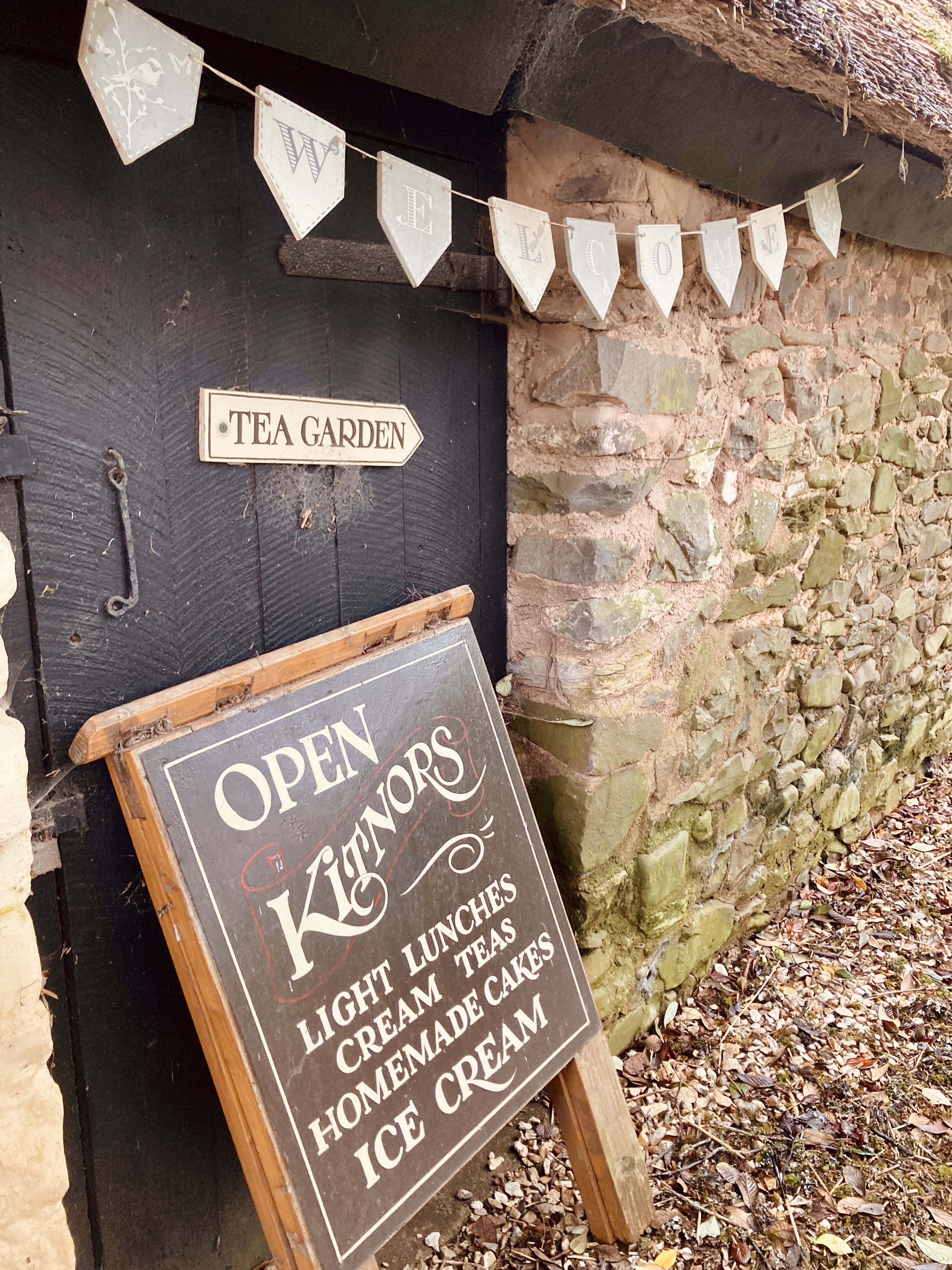 Entrance to Kitnors Tea Rooms and Gardens with cute signage and bunting