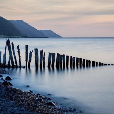 Bossington Beach Porlock Bay Pebbles and Water and sticks barrier