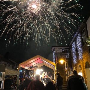 Fireworks in the sky showering over Dulverton by Starlight market