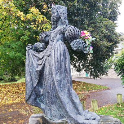 Lorna Doone Statue with flowers in her hand