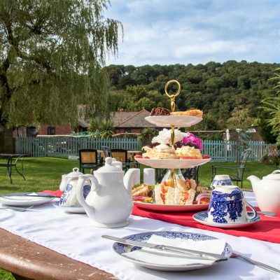 The Copper Kettle Cream Tea Outside in the Garden