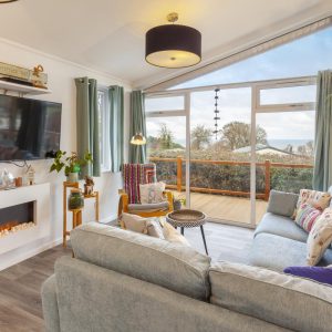 Living room with view at Pebble Lodge, Watchet